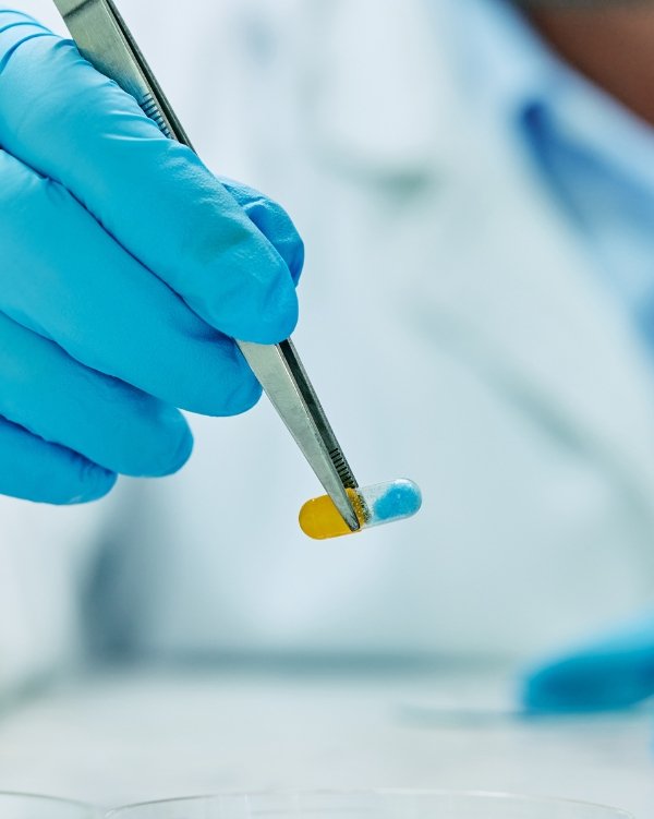 A biotechnologist checking a quality of the medicine in medical lab